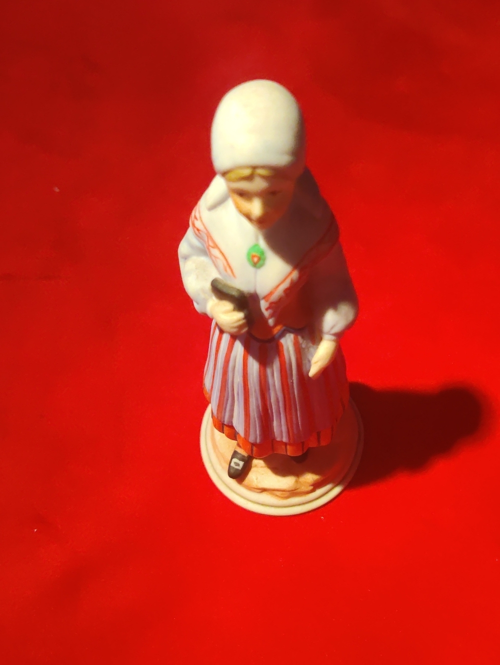 Vintage Hand-Painted Porcelain Figurine Woman in a Traditional Swedish Costume..
